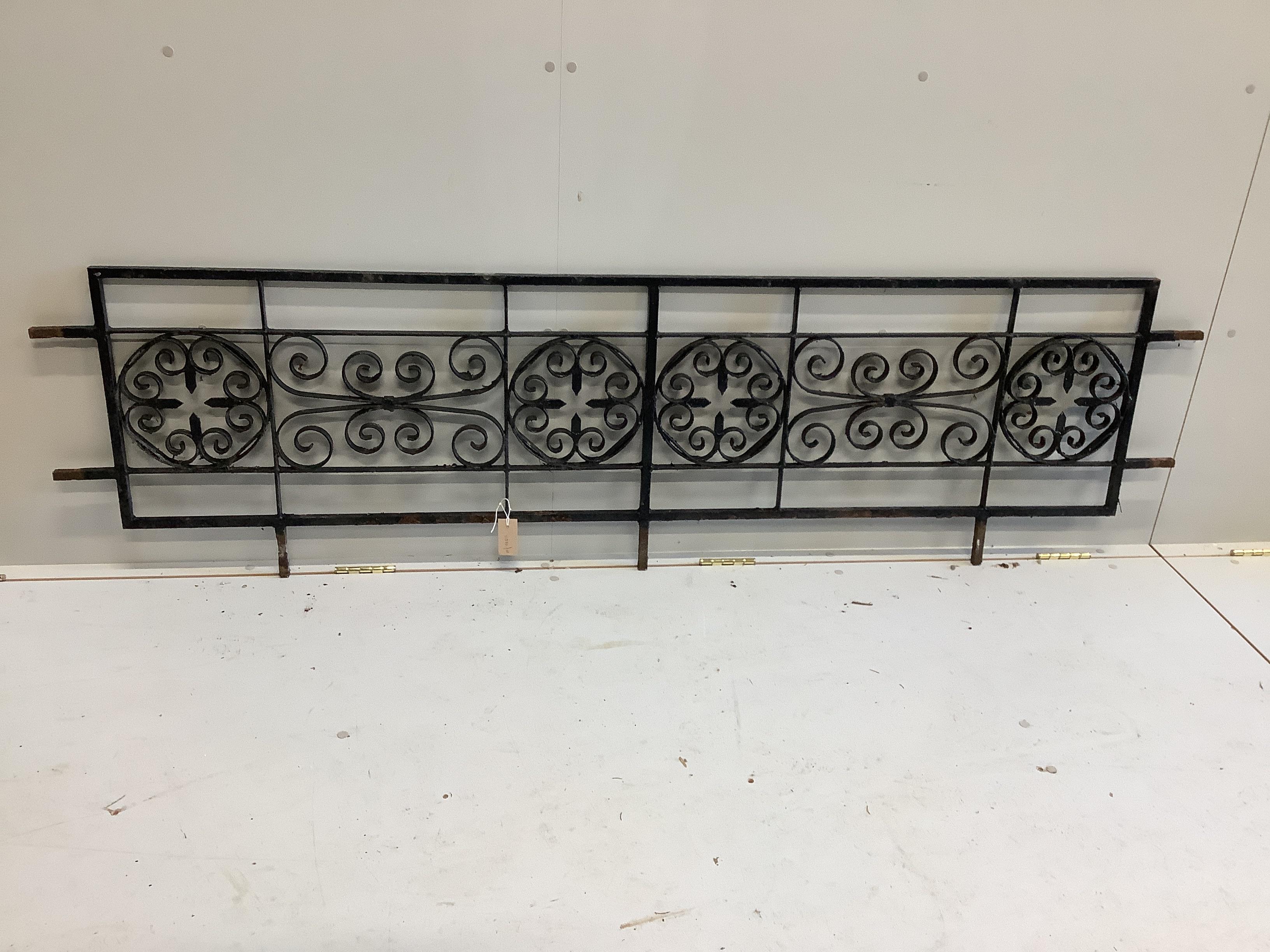 A painted wrought iron panel, height 203cm, width 56cm
